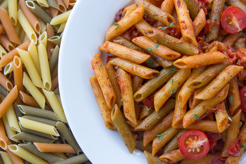 penne arrabbiata with spicy tomato sauce and fresh herbs